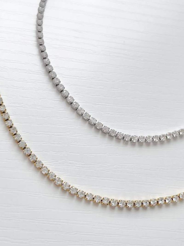 Nika - Rivière Karoliai